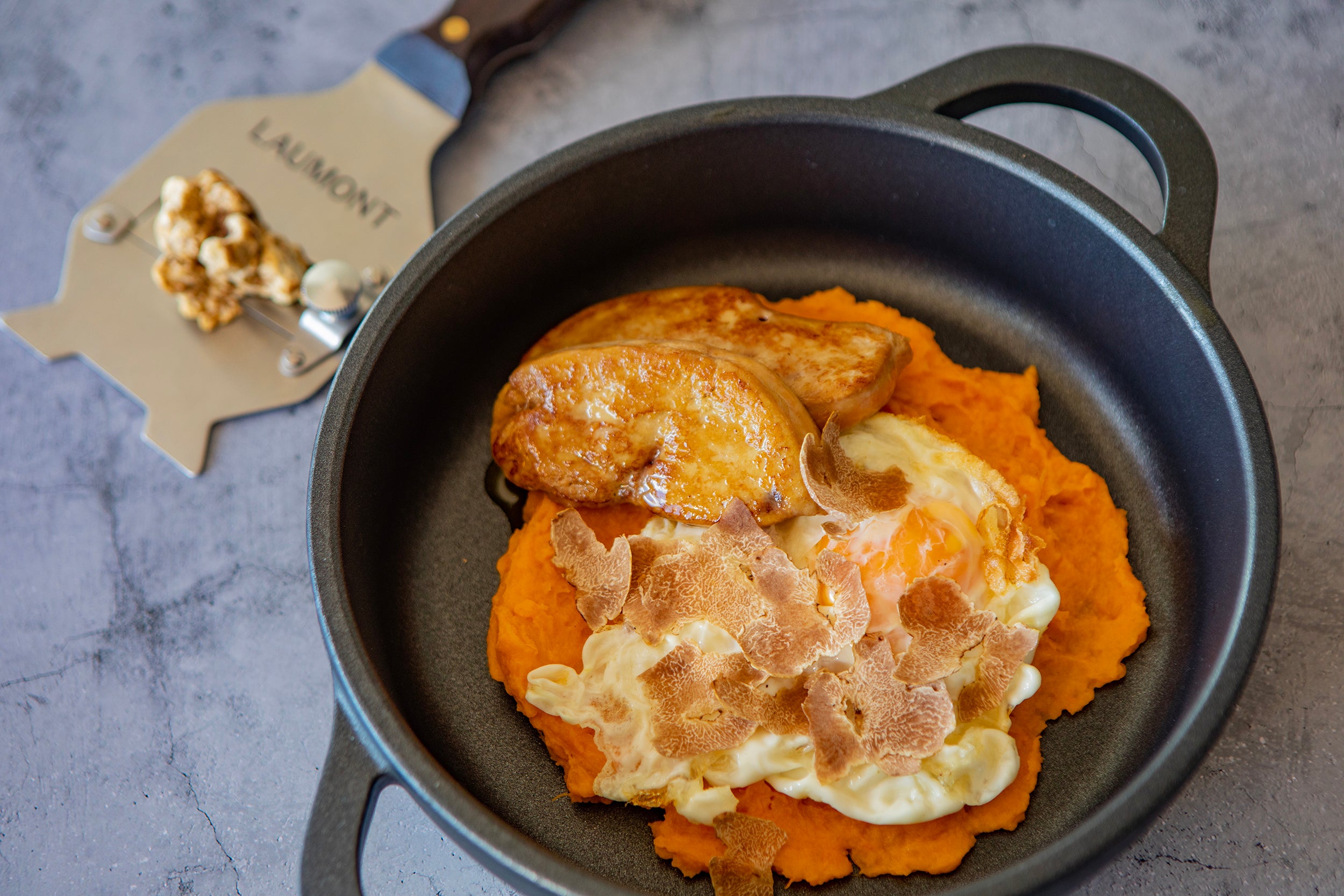 Fried eggs with sweet potato parmentier, foie and white truffle